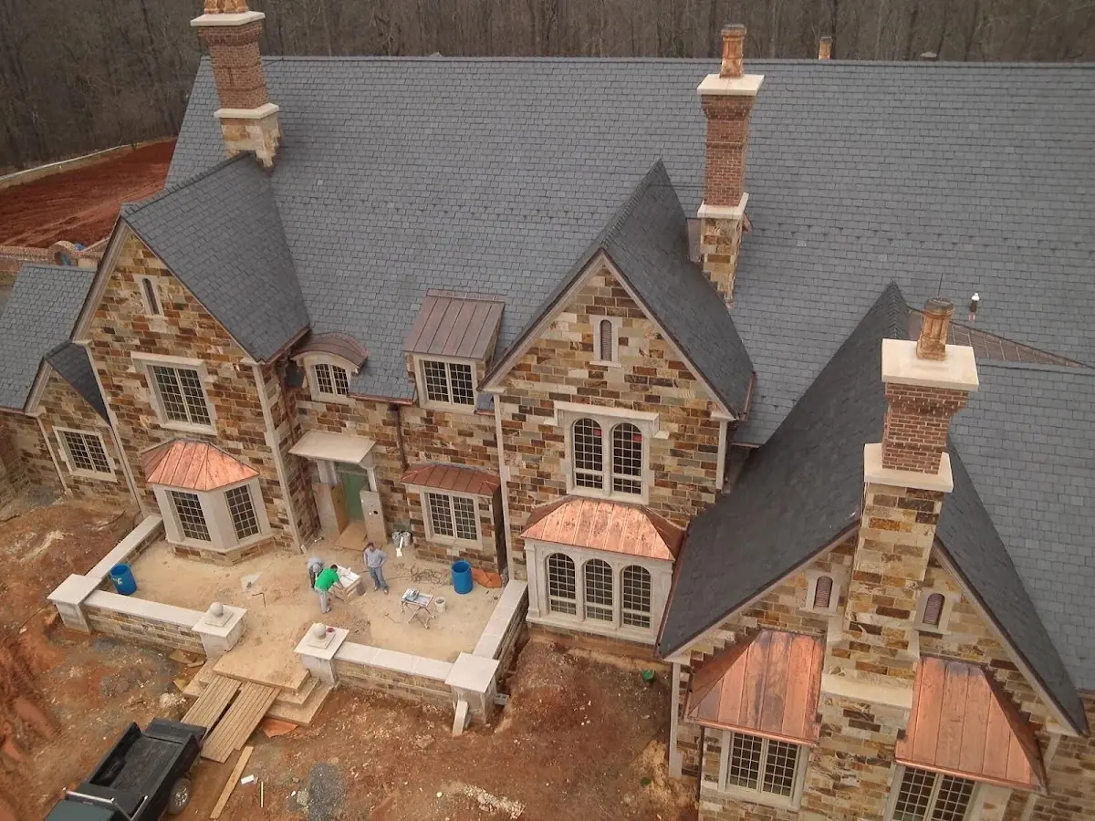 Craftsman Roofing Slate Roof Repair project in Fieldstone
